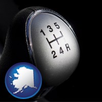 alaska map icon and a 5-speed transmission shift knob
