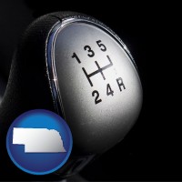 nebraska map icon and a 5-speed transmission shift knob